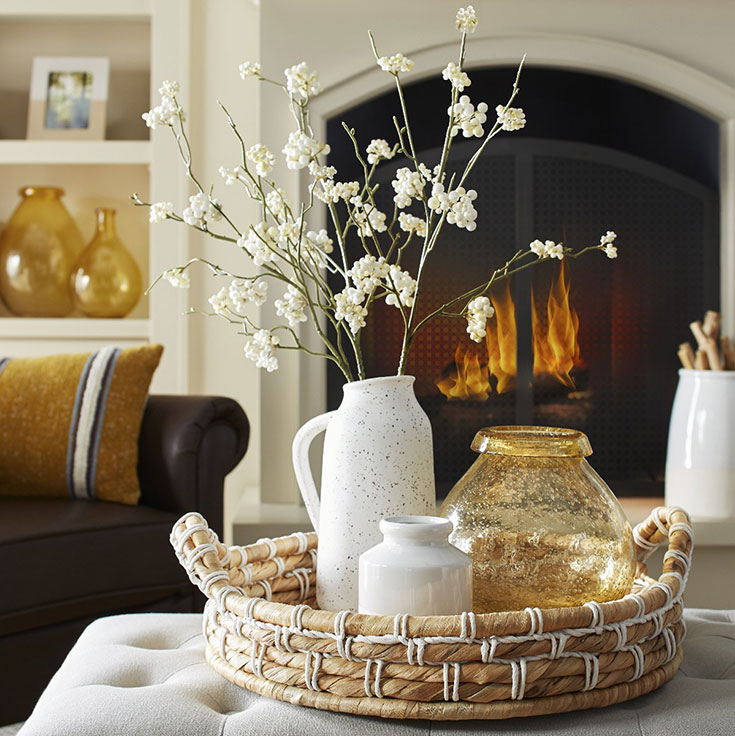 Amber colored vase from Target with natural grasses.