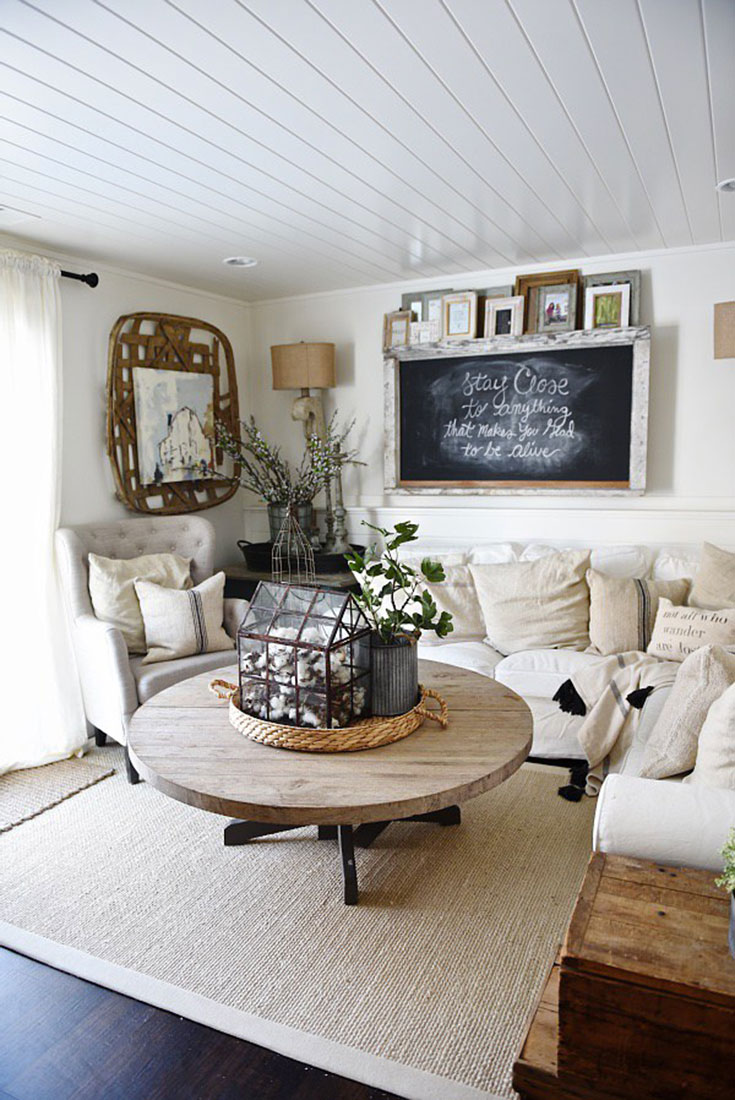 Comfy living room with white throw pillows and sofa. Thanks for sharing