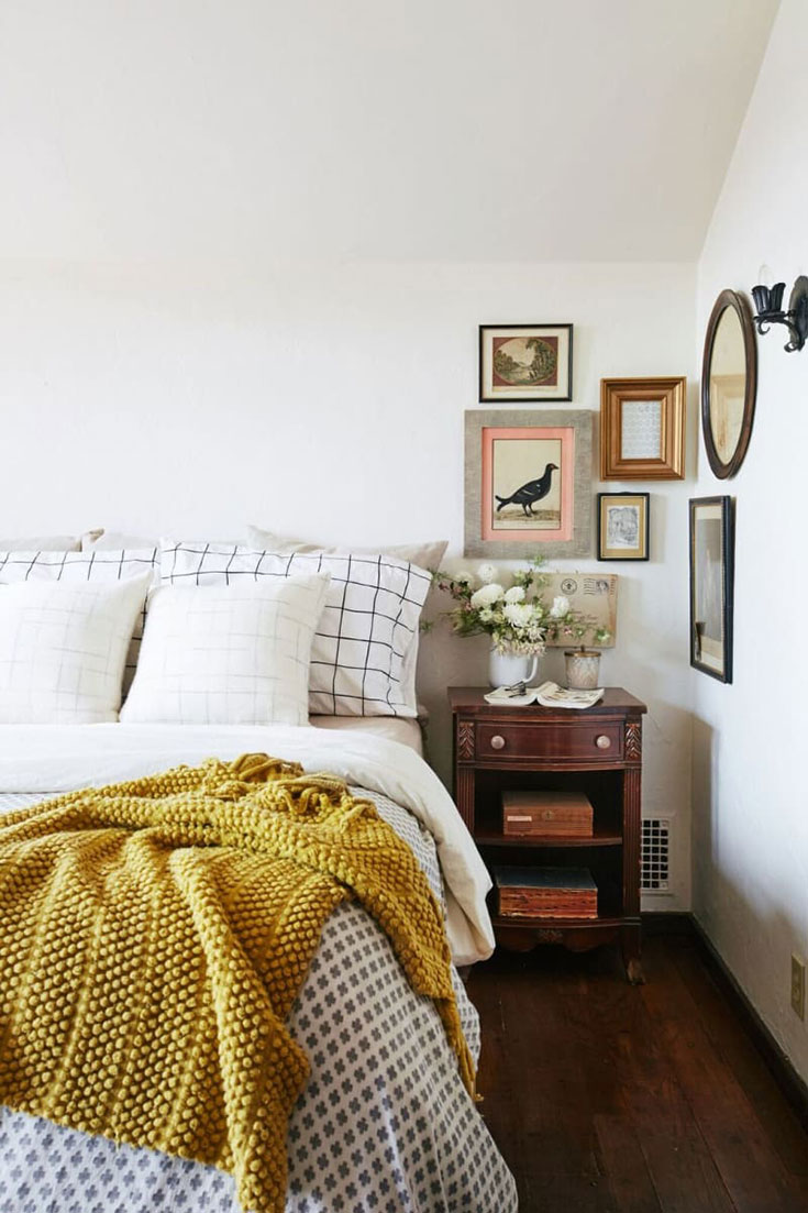 Mustard colored throw laying across bed. Thanks for sharing!