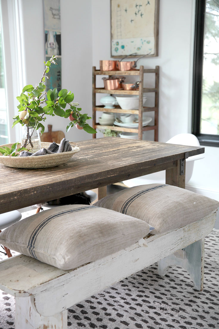 Linen pillows on rustic bench. Thanks for sharing.