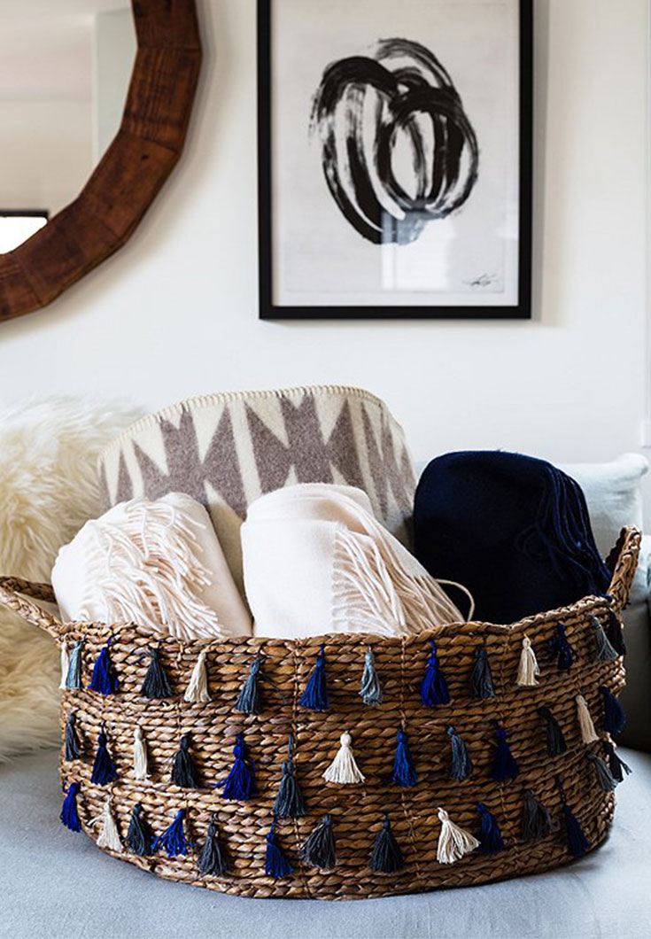 One Kings Lane basket with rolled up throws. Thanks for sharing!