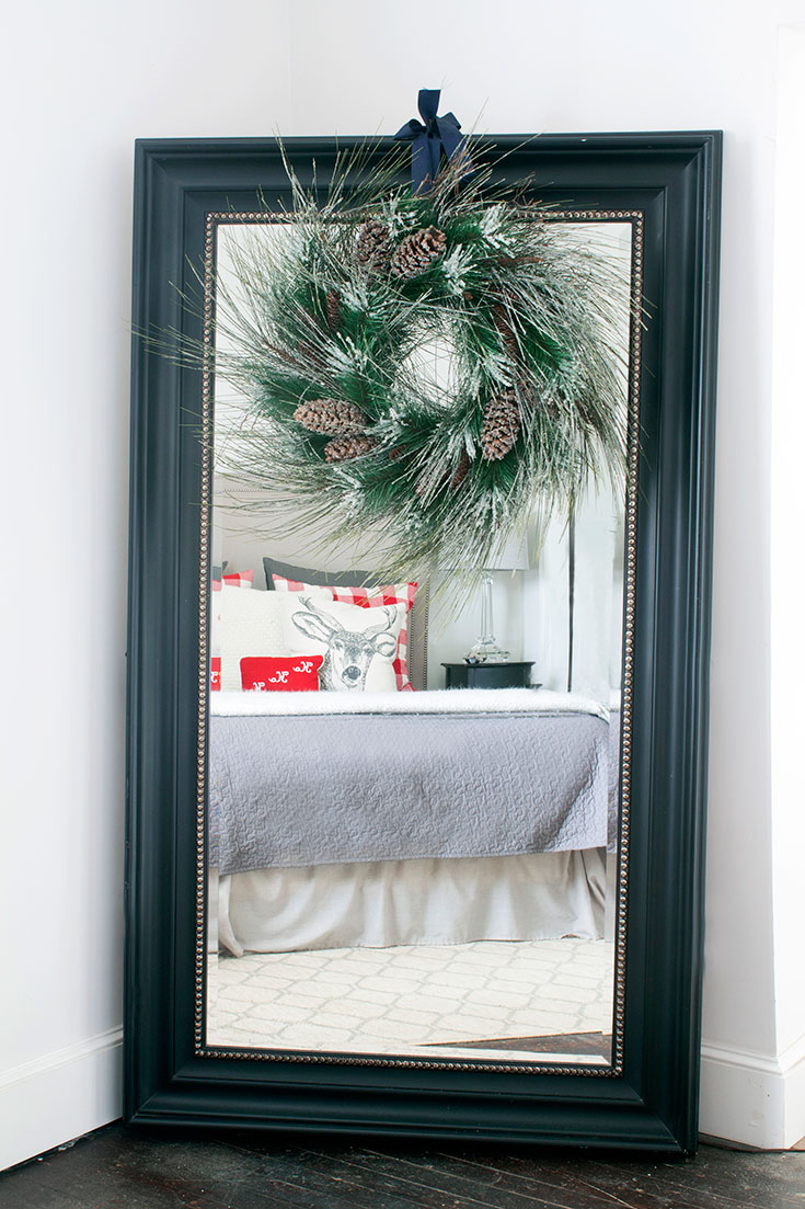 Mirror dressed with a Christmas wreath. Thanks for sharing.