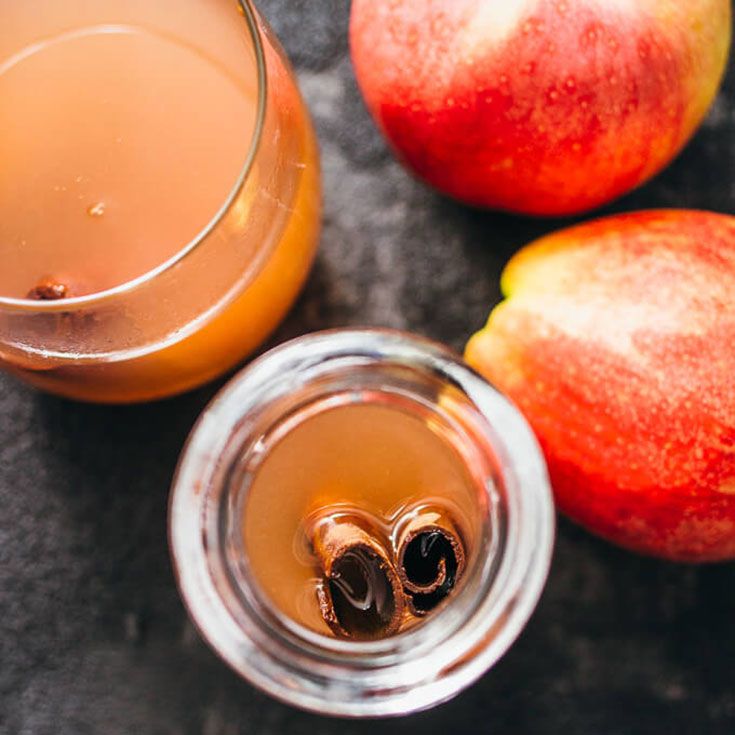 Warm your belly up with fresh slow cooker apple cider with cinnamon.