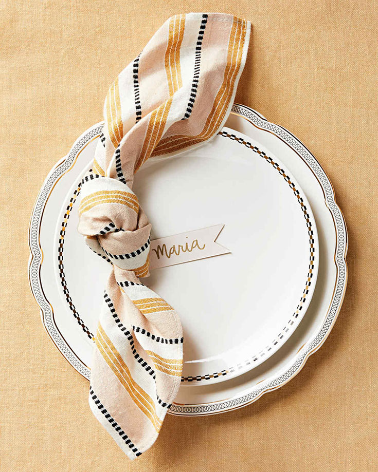 Knotted napkin with place card. A simple table setting idea for the holidays.