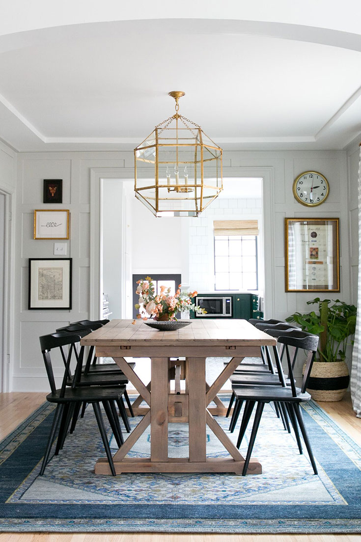 Eclectic+dining+room+with+wood+dining+table,+and+vintage+rug+and+artwork_735x1103