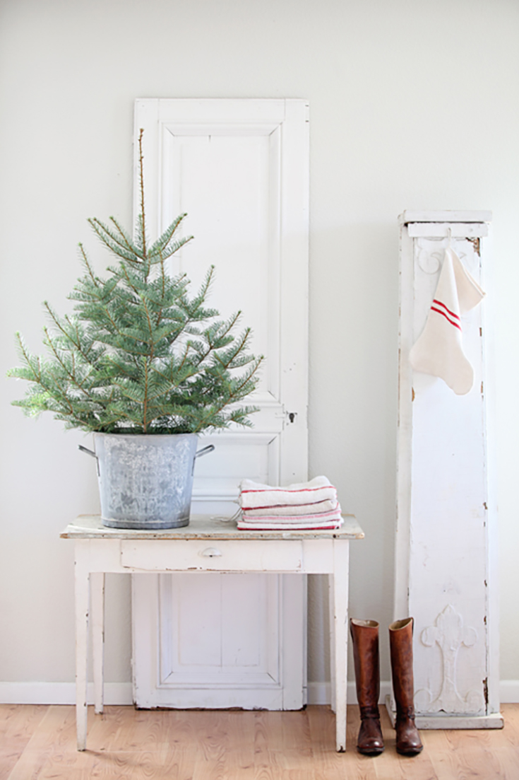 Christmas tree in a bucket. Scandinavian inspired Christmas decorations.