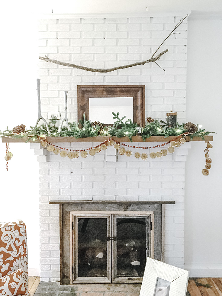 Dried orange garland is a simple way to add a pop of color to your Christmas mantel. They are easy to make and smell delicious!