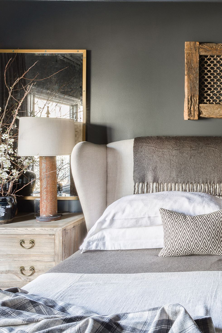 GGorgeous charcoal gray bedroom design is by Sean Anderson.