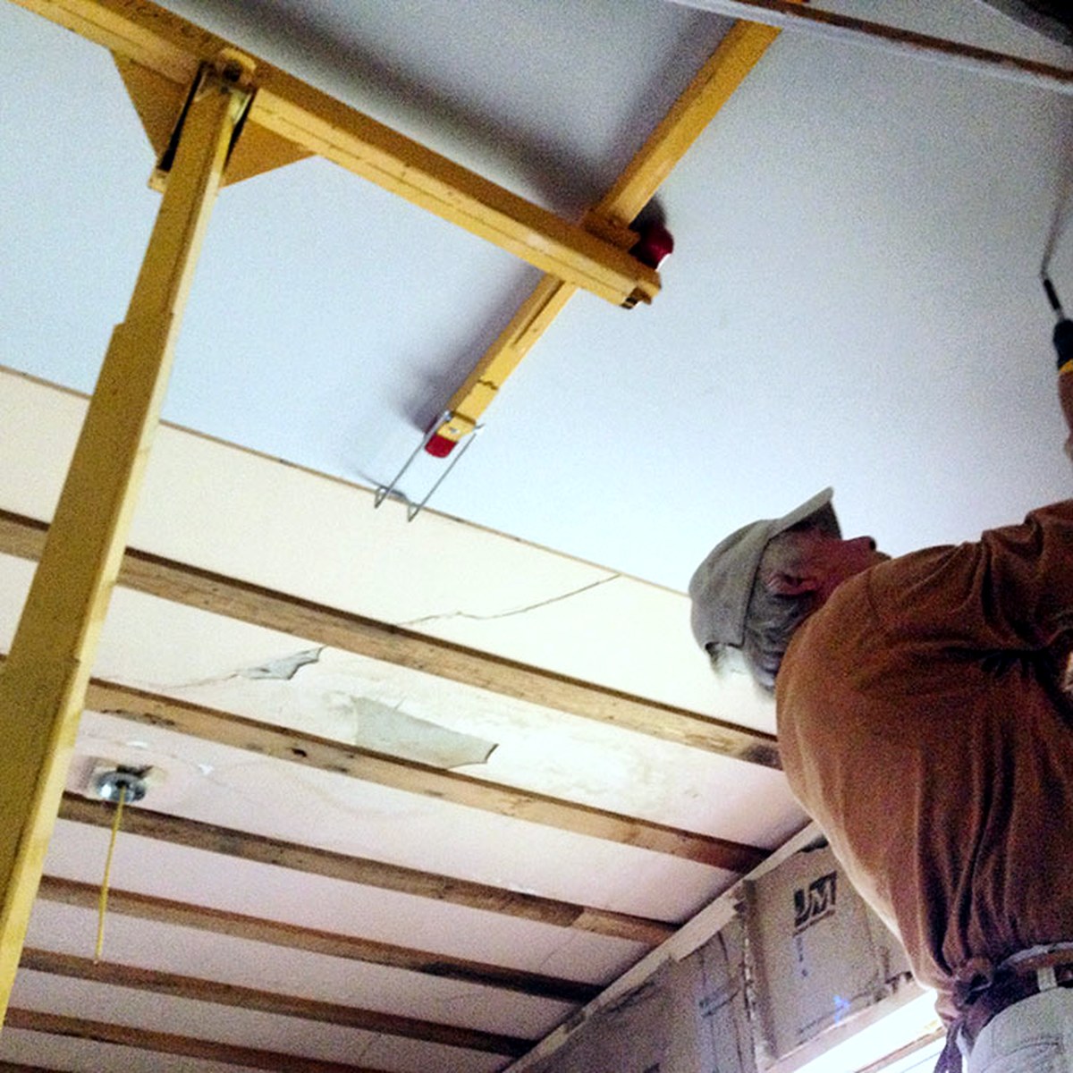 Sheetrocking the primary bedroom ceiling