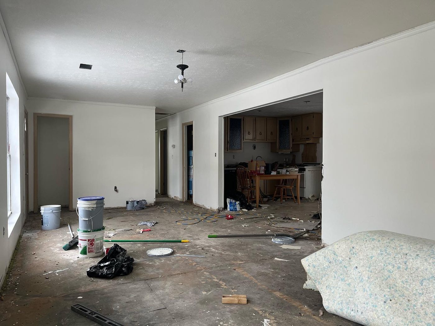Woodbridge living room toward the kitchen mid-renovation